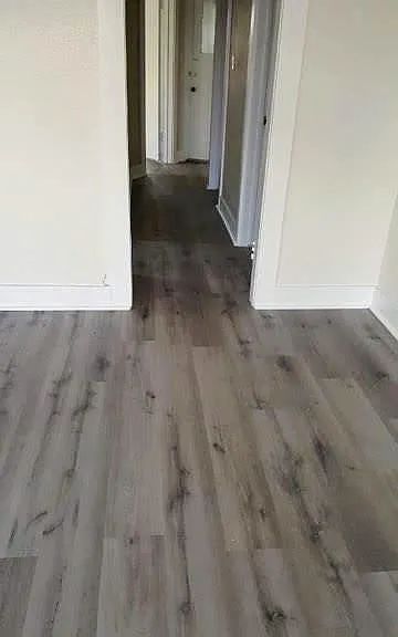 Hallway to bathroom, bedroom, and laundry room