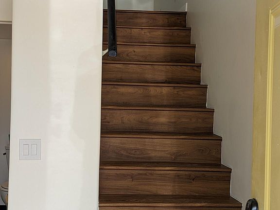 Upstairs to sleeping loft.