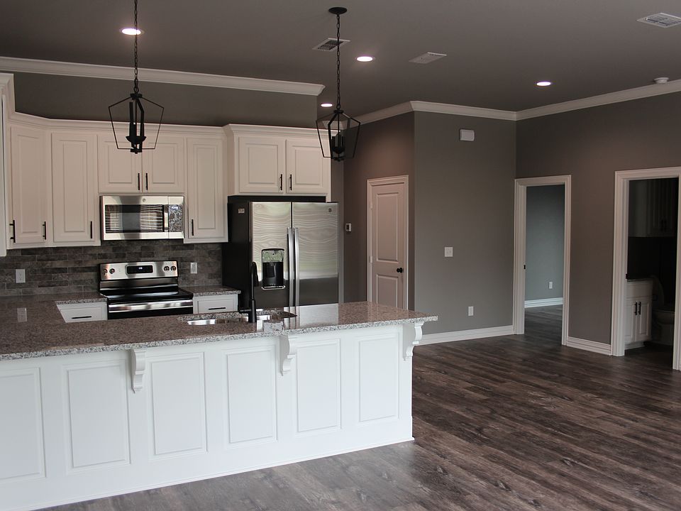 Luxury Kitchen with stainless appliances and granite counter tops