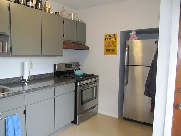 Kitchen, stainless appliances and sink.