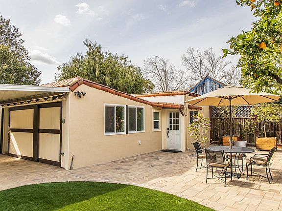 Studio attached to garage in back yard