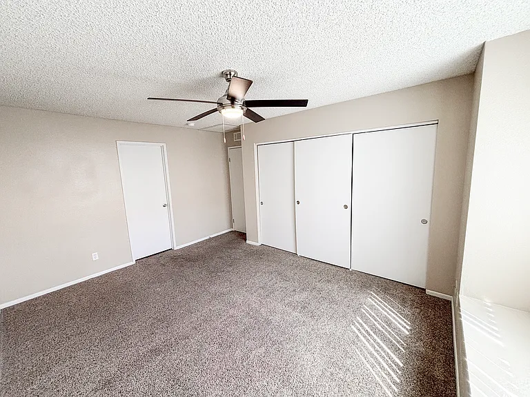 2 bedroom - 2 bathroom apartment:
-main bedroom with sliding 3 door closet, ceiling fanlight and window seat