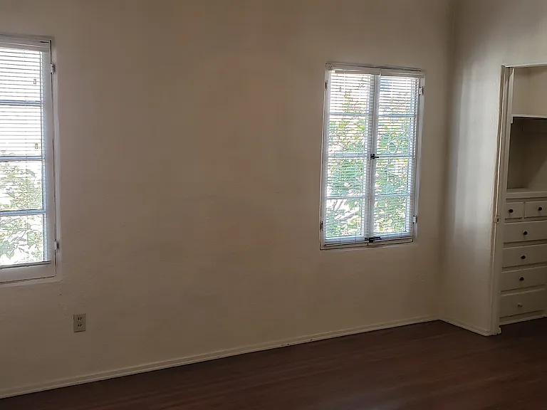 Large bedroom with built-ins