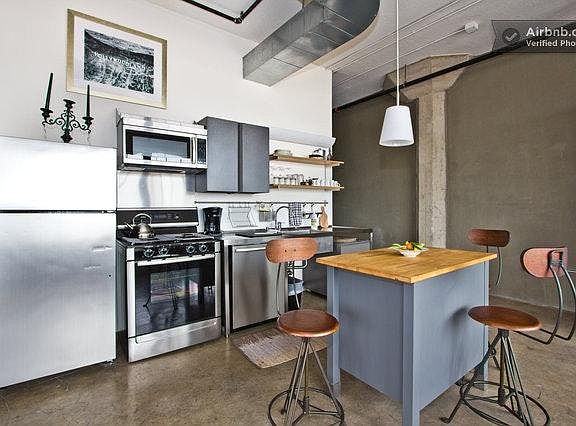 Kitchen with island & vintage stools