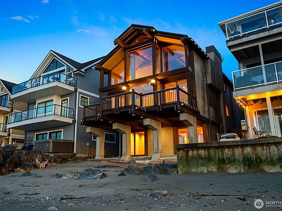Designed by renowned architect Ralph Anderson, this home was named one of the 10 greatest homes in Seattle history by Seattle Met magazine. Home sits on a solid concrete foundation, supported by posts and beams of clear cedar, with a dramatic glass extrusion that extends toward Puget Sound.>