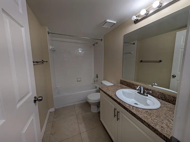 5011 Wiles Rd #208 — Photo 12