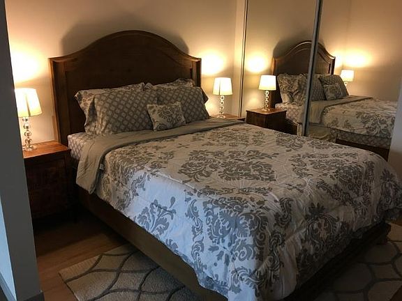 Bedroom with sliding closet