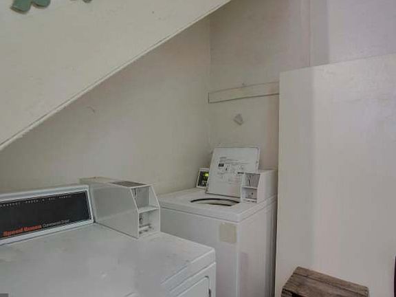 Washer and drier in building