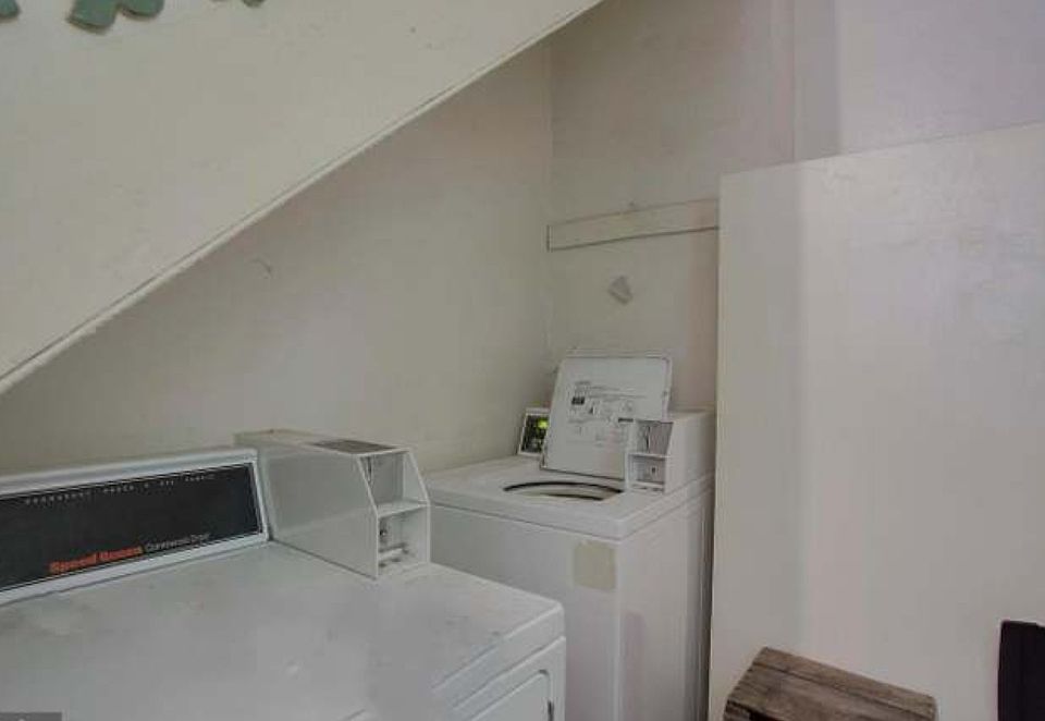 Washer and drier in building