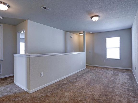 Roomy game room at the top of the stairs!