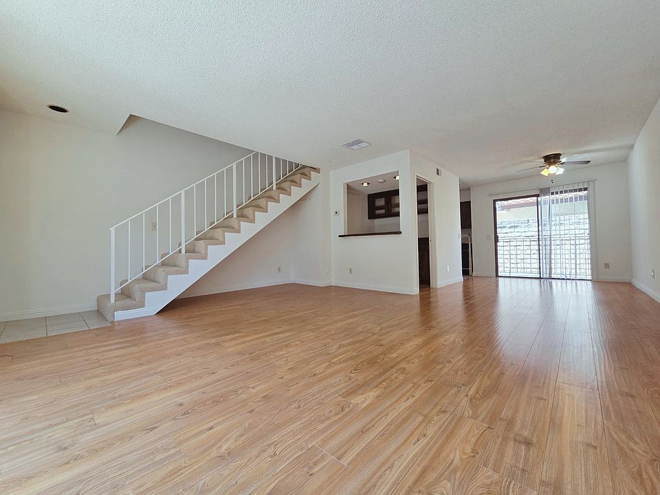 Living Room w/ Bar Area and Dining Area