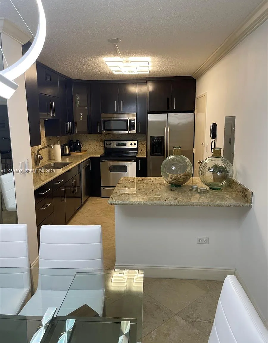 Oceanside Plaza Condo — Photo 1