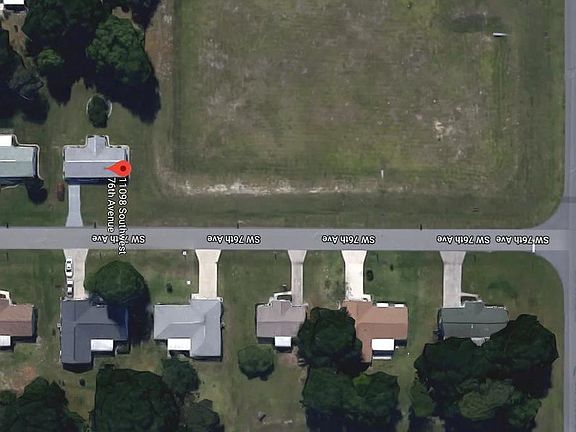 Home is adjacent to 2-acre retention basin. NO neighbors to the side!