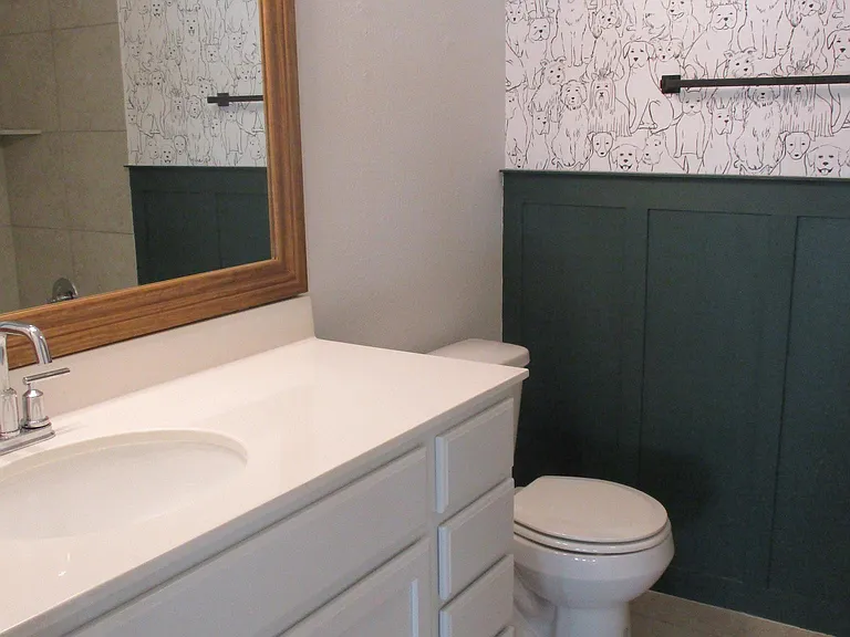 Upstairs full bathroom2 with tile floor w/ wainscoting