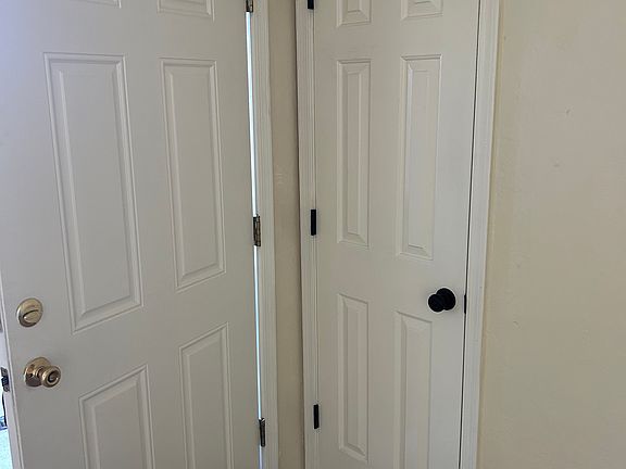 Interior view front door and coat closet