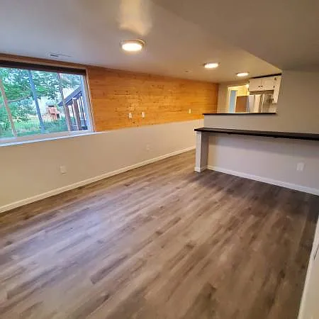 Living room, breakfast bar, looking toward kitchen