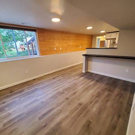 Living room, breakfast bar, looking toward kitchen