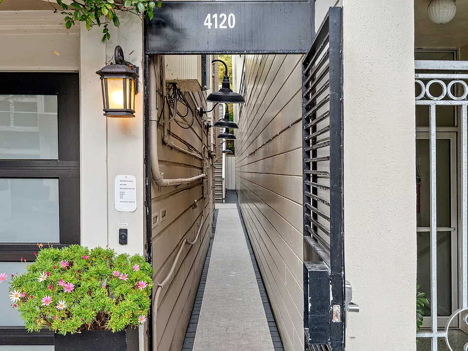 Entry to rear of building to front door for 4120