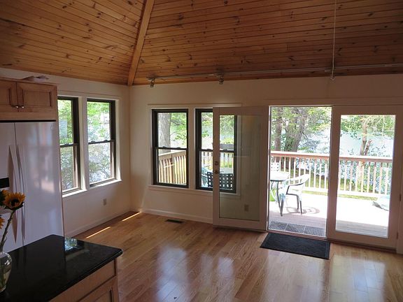 Great room, kitchen, deck before enclosed