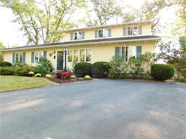 Arriving at your beautiful 5 bedroom 3 bath colonial. Plenty of parking for you and your guests.