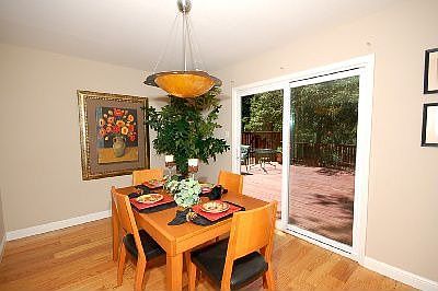 Large dining room easily accomodates a table for 6