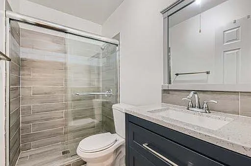 Full bathroom with glass door