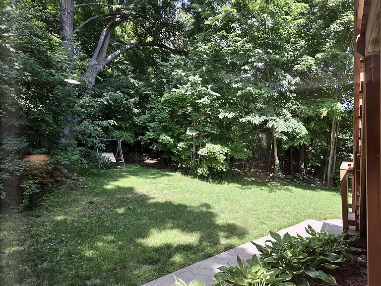 Large front yard and maintained gardens