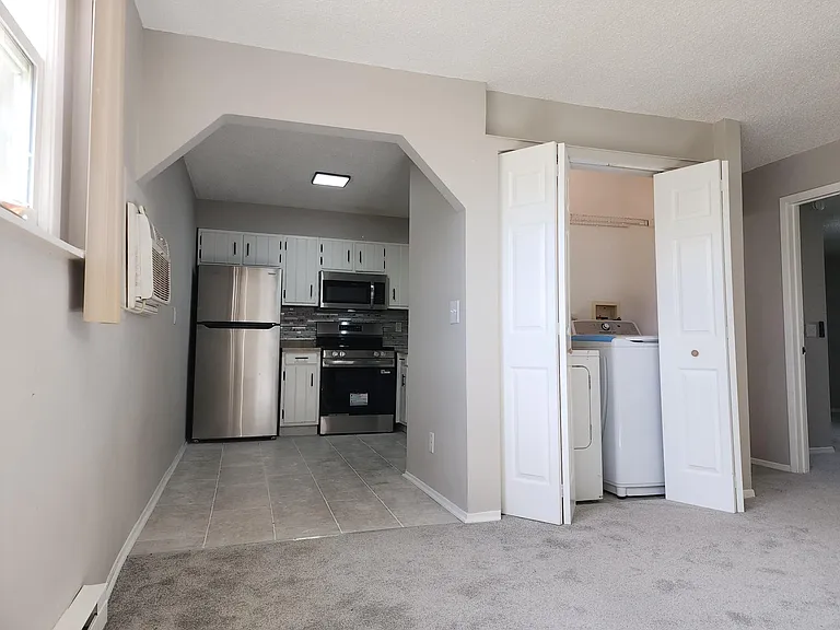 Open Layout with Washer and Dryer
