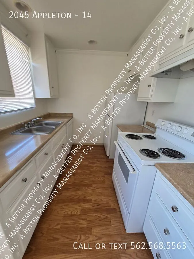 Bright Upper 1 Bed w/Modern Hardwood Laminate Floors, Dishwasher & Onsite Laundry in Gated Property! — Photo 3