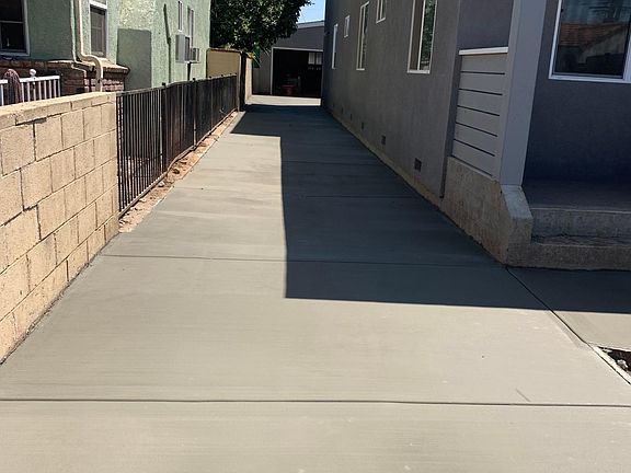New driveway towards the 2-car garage reserved for this unit