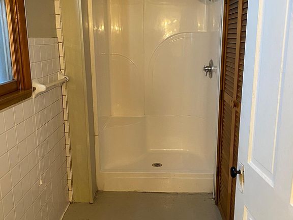 Main level bath with 4 ft shower(no tub). Bathroom has a closet for all your bathroom storage needs.