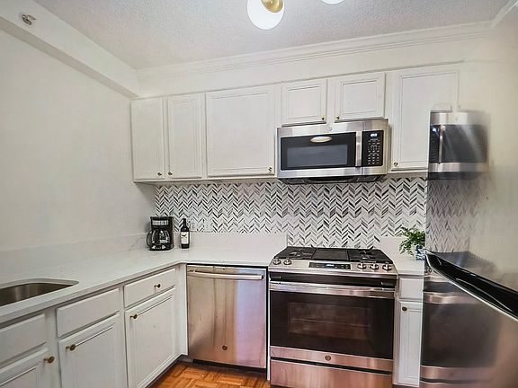 5th image of 7111 Woodmont Ave APT 107