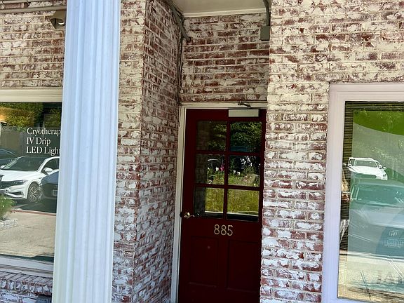 Entrance in the rear of the building.