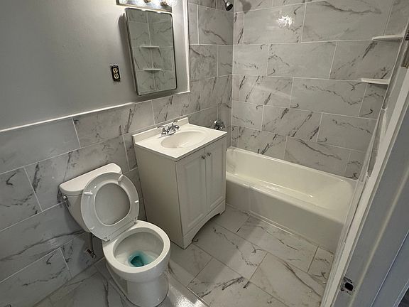 Newly renovated tile bathroom