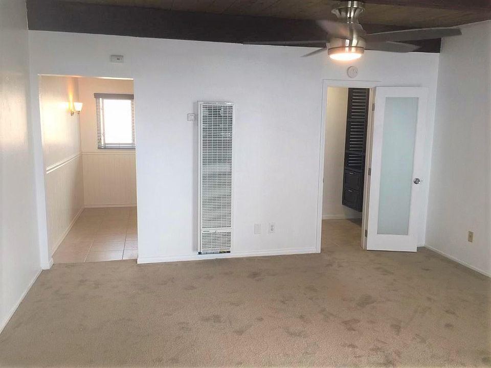 Front Room - Kitchen to the left and Dressing area and bathroom on right with frosted glass door