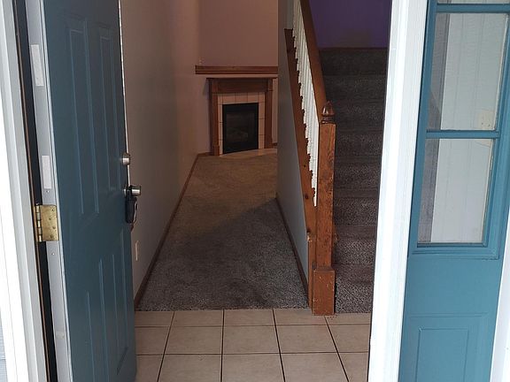 Front door view, looking into living room