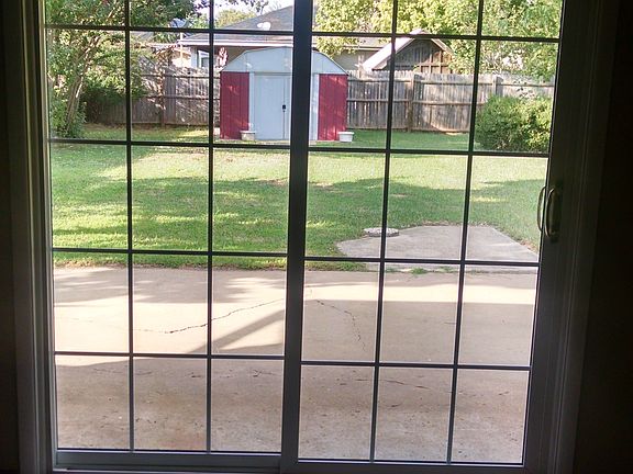 View of backyard thru living room