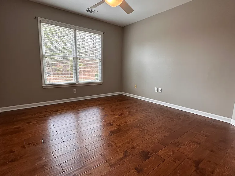 Large Upstairs Middle Bedroom with large walk in closet (with extra storage space); across from upstairs hall bath.