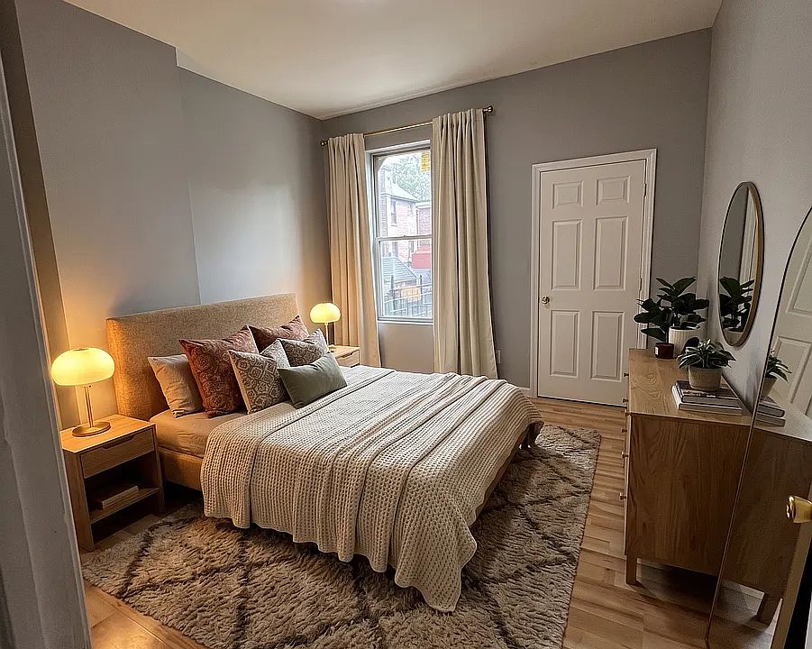 Bedroom- This room has been virtually staged using AI to help visualize its layout and design potential.
