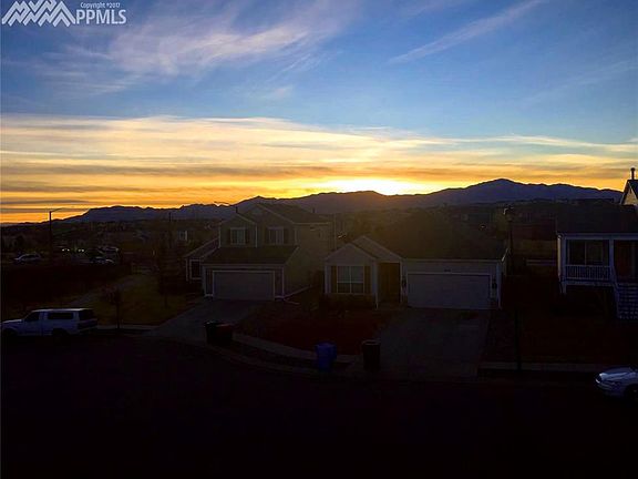 Gorgeous Colorado Sunset over the Mountains from Front of Home