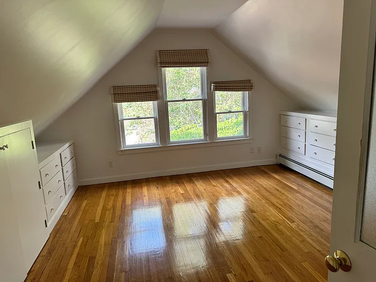 1st bedroom with a lot of storage and drawer space.
