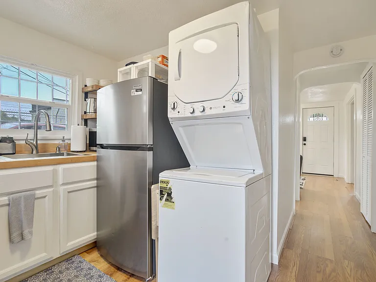 Washer and dryer located right in the kitchenette space for your convenience.