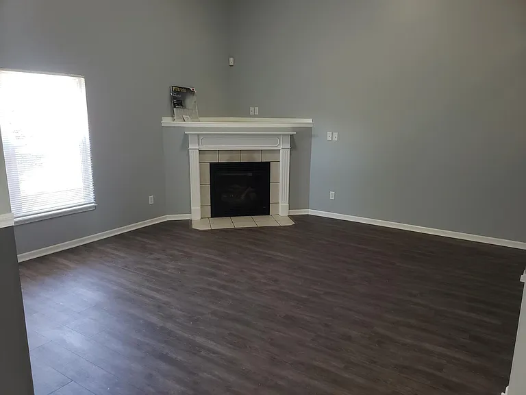 View of living room w/ fireplace