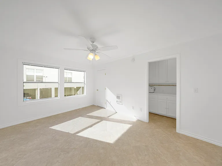 Living area looking into kitchen area