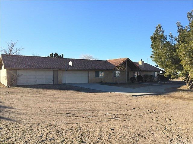 4 car garage. ranch style home.