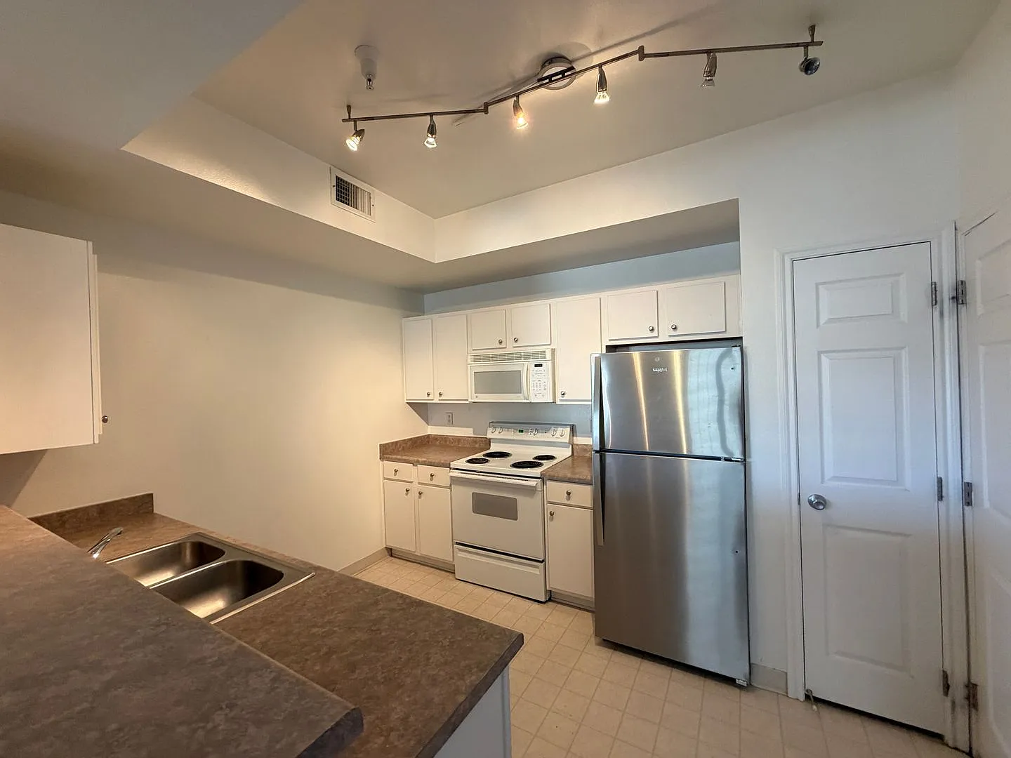 Bright 2-Bedroom Ironstone Condo with Covered Deck, Walk-In Closets & Resort-Style Amenities — Photo 3