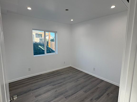 Large bedrooms with natural light, ceiling fans delayed by Home Depot delivery. Will be installed next few days.