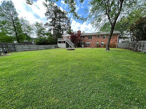 Highway fenced back yard