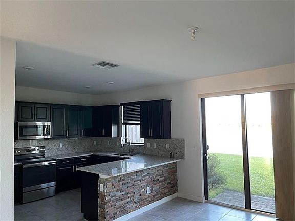 5th image of 13017 Anthorne Ln