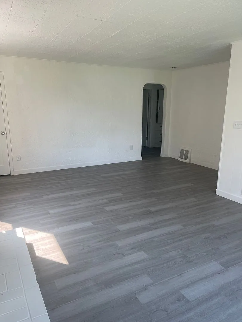 $500 Off First Month's Rent!! Spacious 4-Bedroom Home with Fireplace, Covered Patio & Detached Ga... — Photo 2